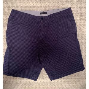 “Stay Stylish with Tommy Hilfiger Men’s Flat Front Gingham Style Short”